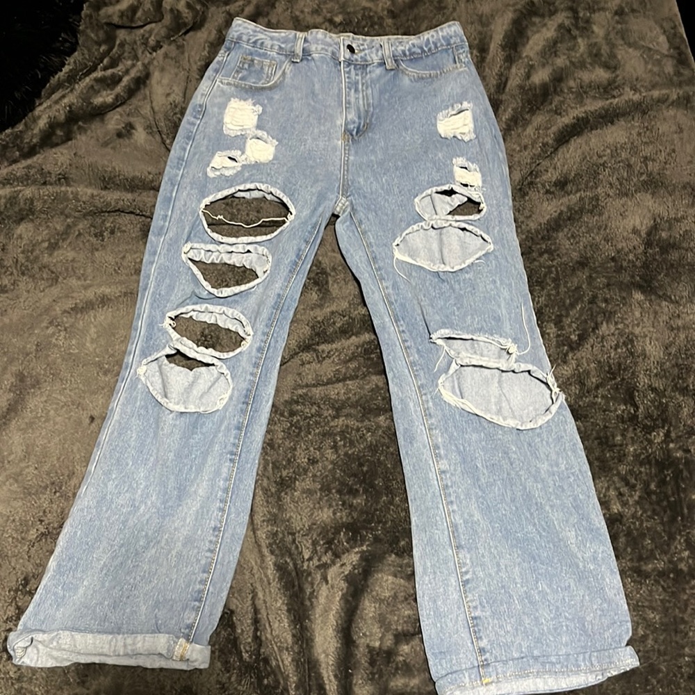size 10 straight legged light blue distressed jeans